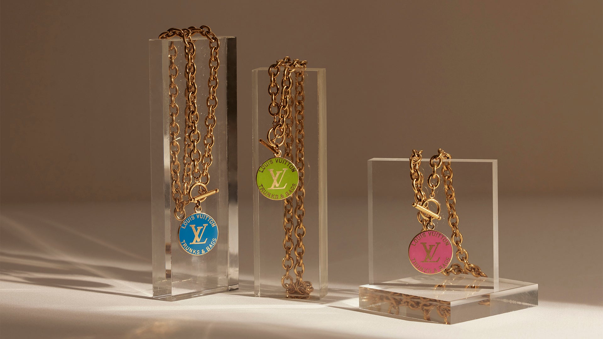 Authentic Louis Vuitton necklace repurposed from a LV Trunks and Bags Breloques Bag Charm exclusively at collectcora.com