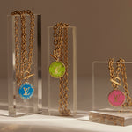 Authentic Louis Vuitton necklace repurposed from a LV Trunks and Bags Breloques Bag Charm exclusively at collectcora.com